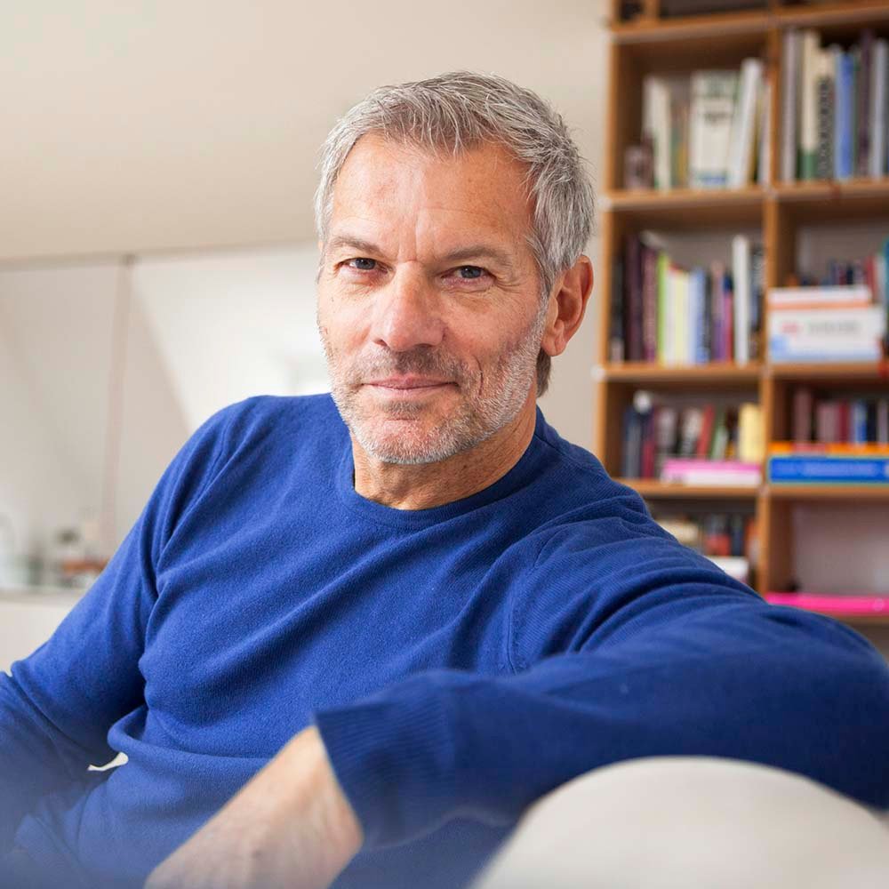 Portrait of relaxed man at home EFLEKCX.jpg